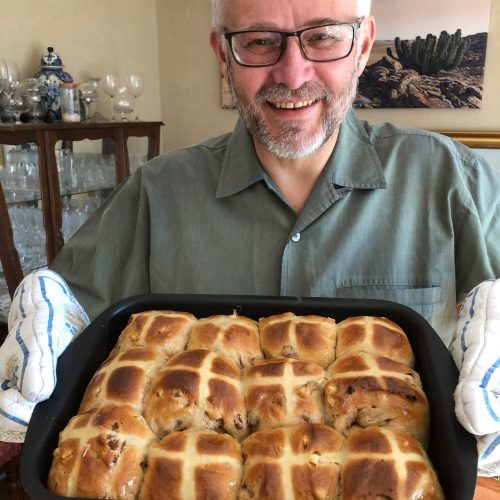 JP at home in Malmö with a tray of freshly baked hot cross buns